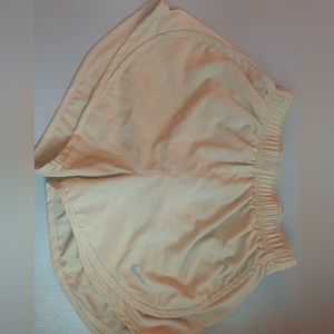 off white nike running shorts high rise in a size 2 hardly been worn